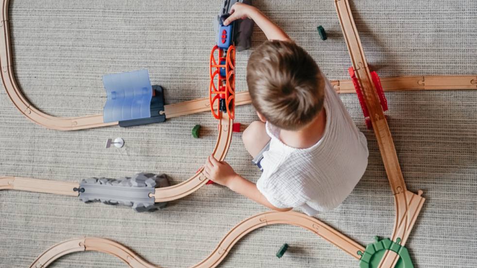 child with train set